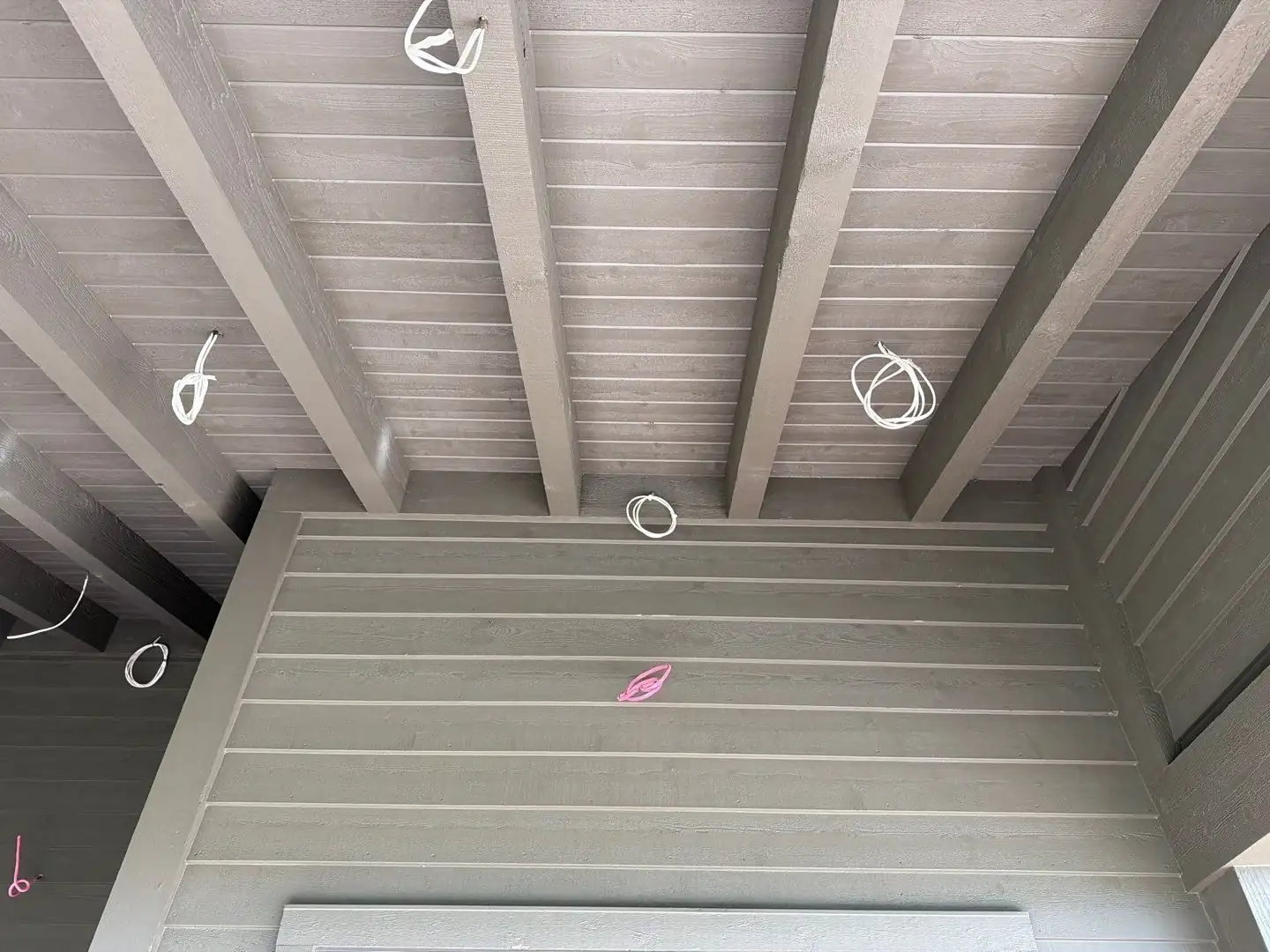 In-ceiling outdoor speaker on a covered porch