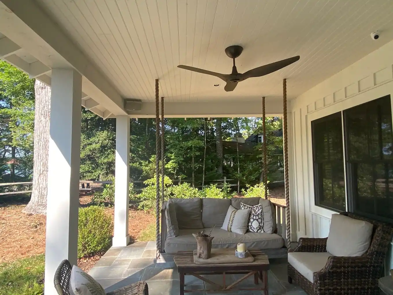 Screened porch with outdoor audio and ceiling fan