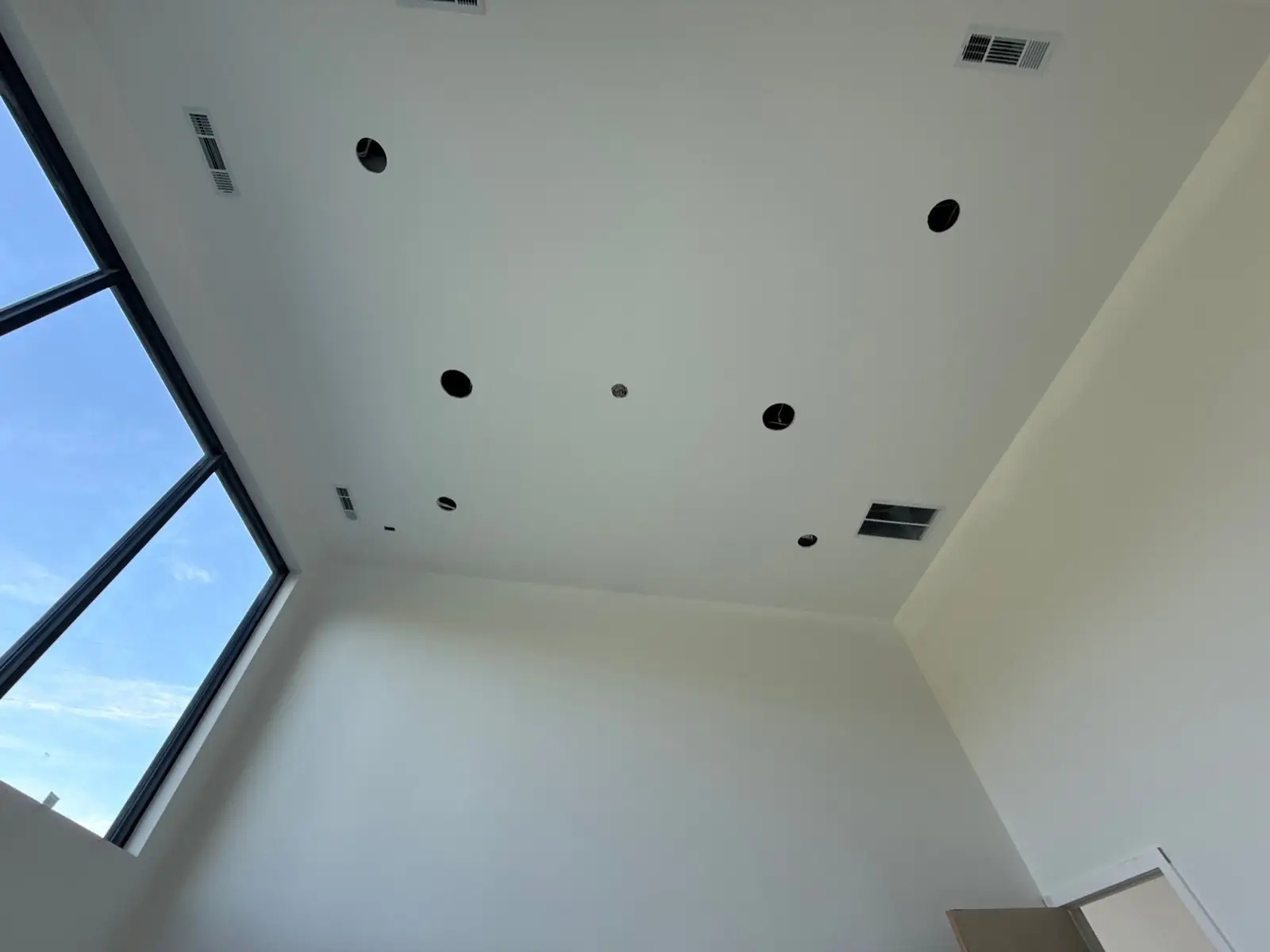 Living room ceiling with surround speaker locations